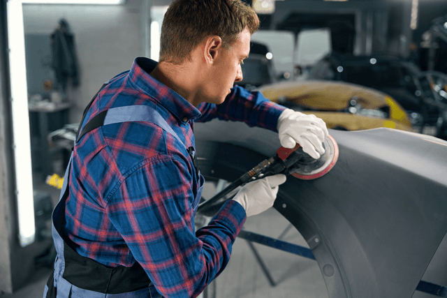 technician adding custom car designs