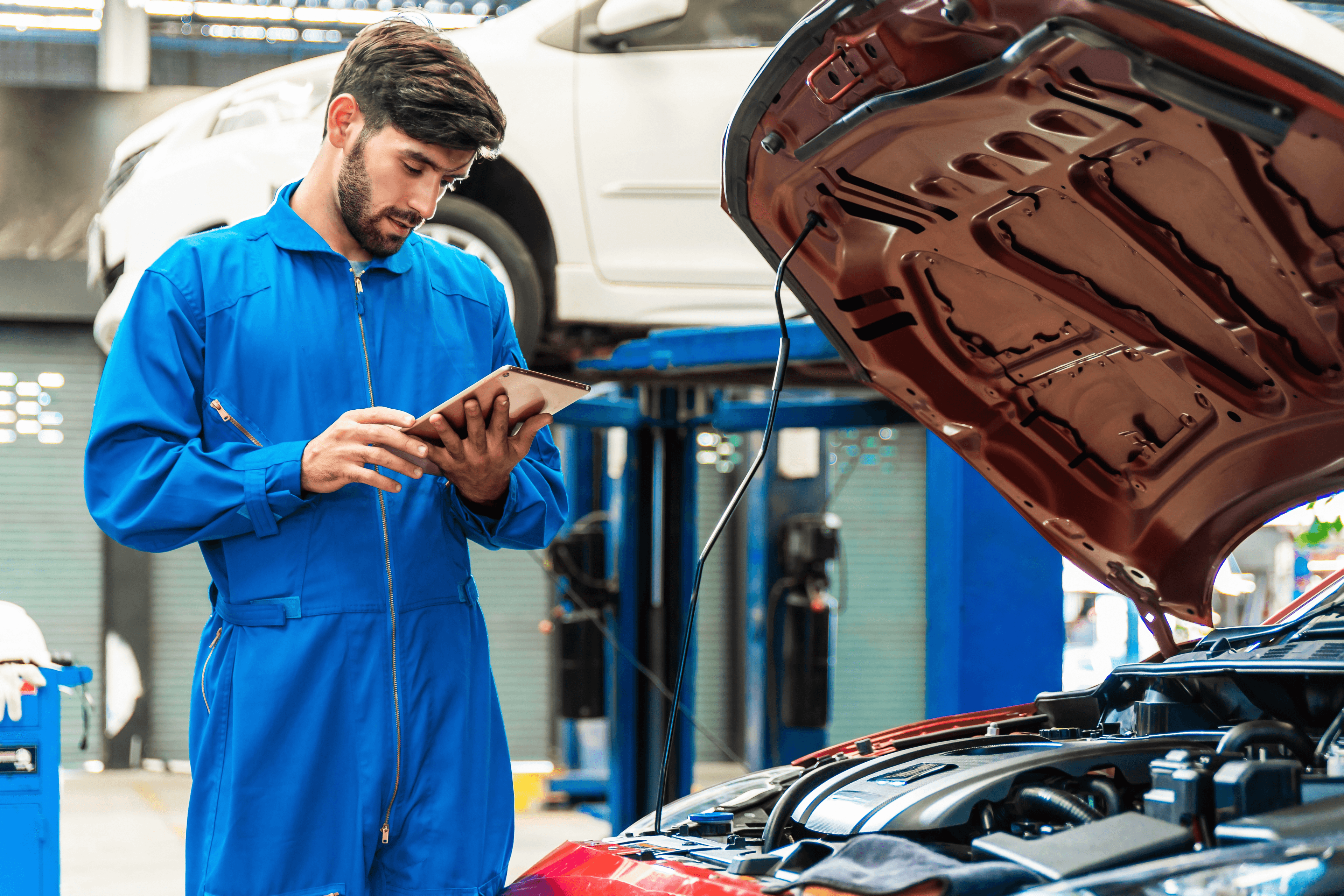 Mechanic fixing car frame